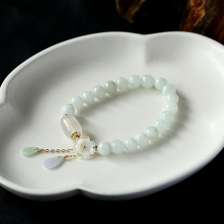 Bransoletka z naturalnego białego jadeitu z Buddha Stones
