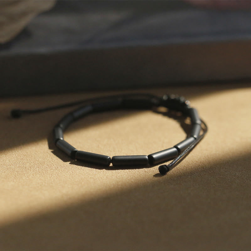 Bransoletka ochronna z Buddha Stones i czarnymi koralikami onyksowymi