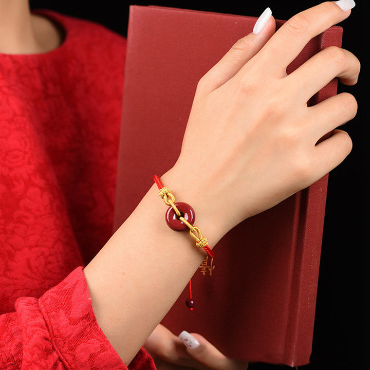 Bransoletka pleciona z ręcznie robionej klamry Cinnabar Peace Buddha Stones