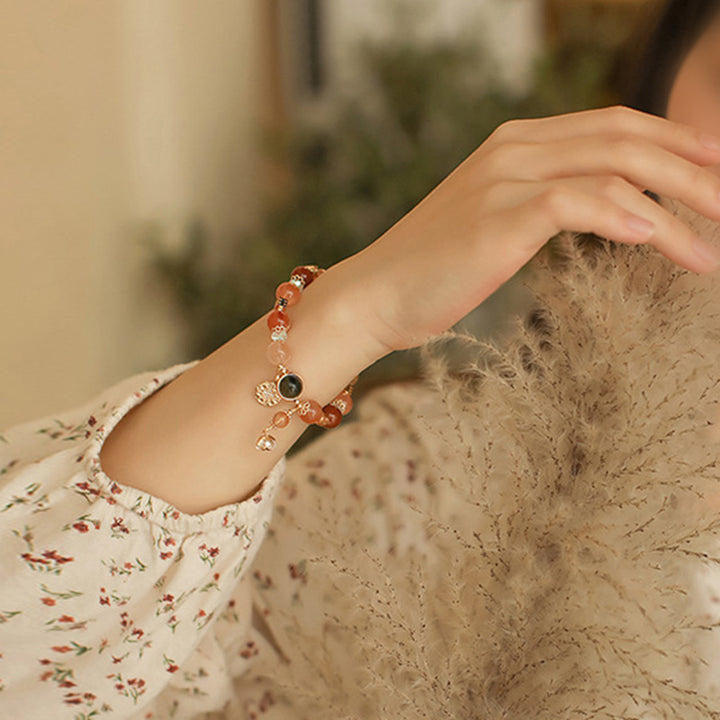 Bransoletka Buddha Stones Natural Multicolored Rutilated Quartz Eight-ramienna gwiazda Flower Wealth