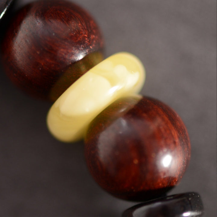 Buddha Stones Małe Liście Czerwonego Drzewa Sandałowego Om Mani Padme Hum Grawerowana Bransoletka Ochronna