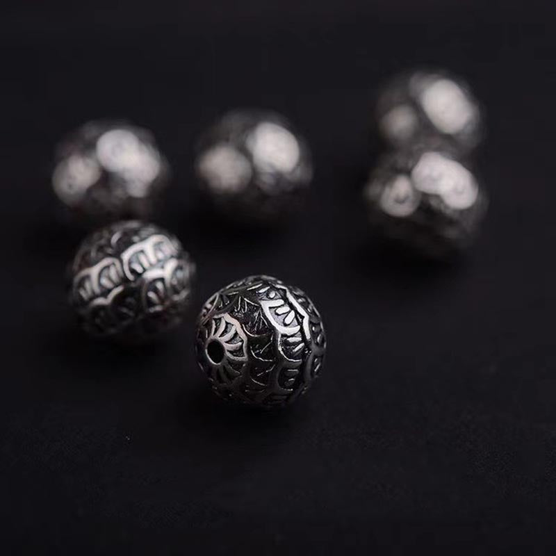 Buddha Stones, skały lawowe, łuski ryb, koraliki, bransoletka lecznicza