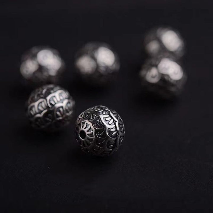 Buddha Stones, skały lawowe, łuski ryb, koraliki, bransoletka lecznicza