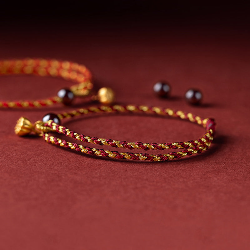 Bransoletka warkoczowa z Buddha Stones wykonana ręcznie z czerwonego złota, sznurka, lotosu, pokoju i radości