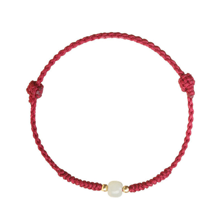 Bransoletka pleciona z Buddha Stones wykonana ręcznie z jadeitu, koralików szczęścia i obfitości