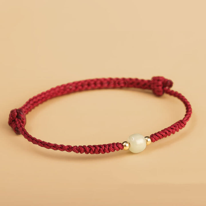 Bransoletka pleciona z Buddha Stones wykonana ręcznie z jadeitu, koralików szczęścia i obfitości