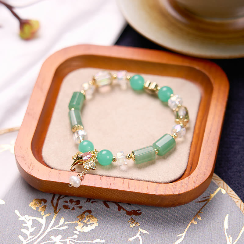 Bransoletka z Buddha Stones , ametystem, zielonym awenturynem, kwarcem truskawkowym i pozytywnym słoniem