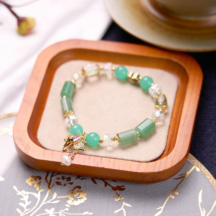 Bransoletka z Buddha Stones , ametystem, zielonym awenturynem, kwarcem truskawkowym i pozytywnym słoniem