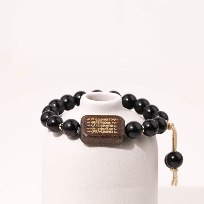 Bransoletka z grawerowanym pismem pokoju z Buddha Stones z drewna hebanowego