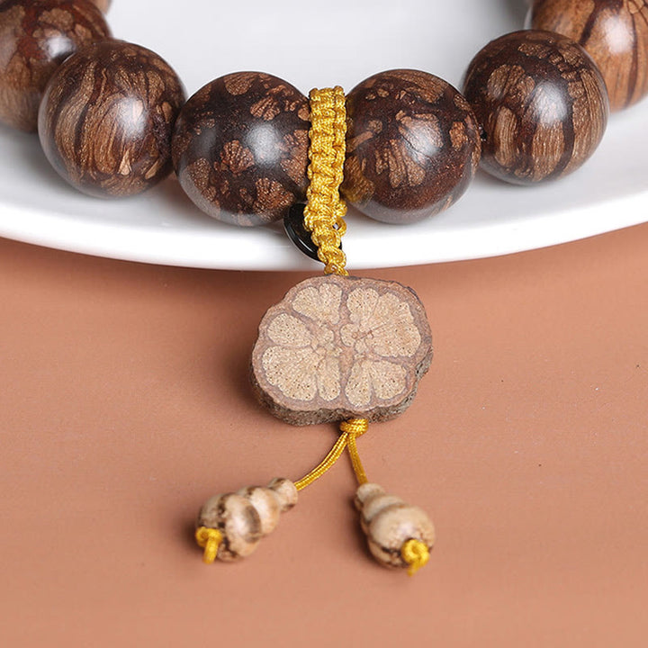 Bransoletka Buddha Stones Plum Blossom Wood Inner Peace