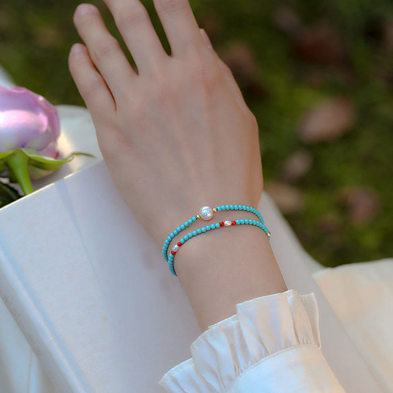 Bransoletka ochronna z małych koralików z Buddha Stones i czerwonego agatu