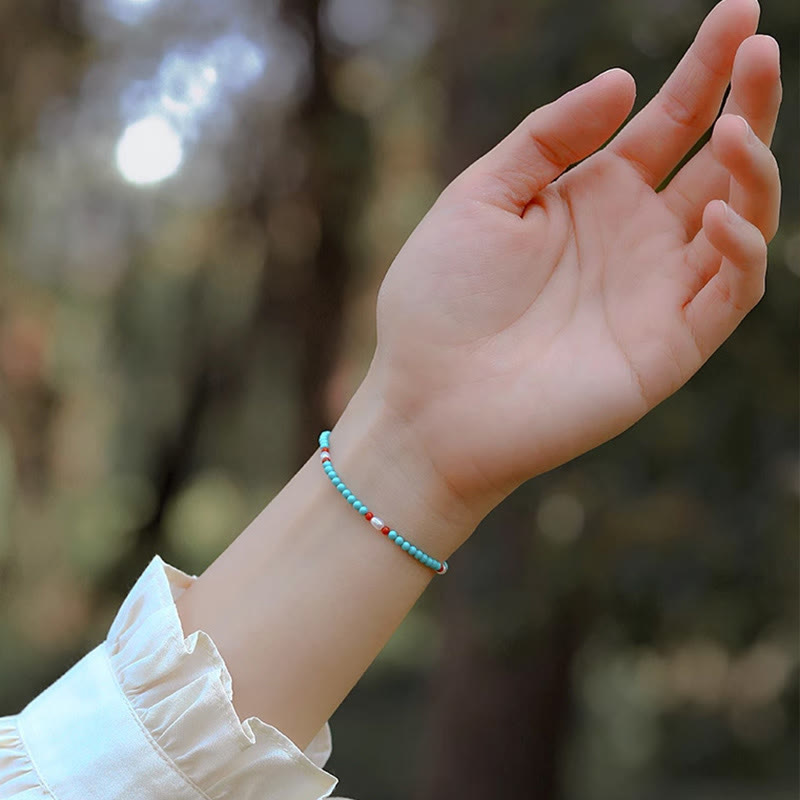 Bransoletka ochronna z małych koralików z Buddha Stones i czerwonego agatu