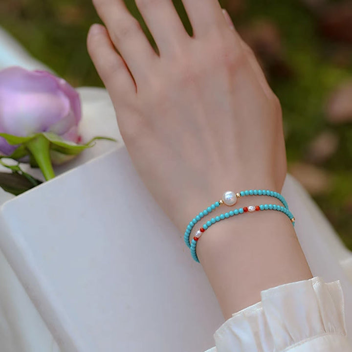 Bransoletka ochronna z małych koralików z Buddha Stones i czerwonego agatu