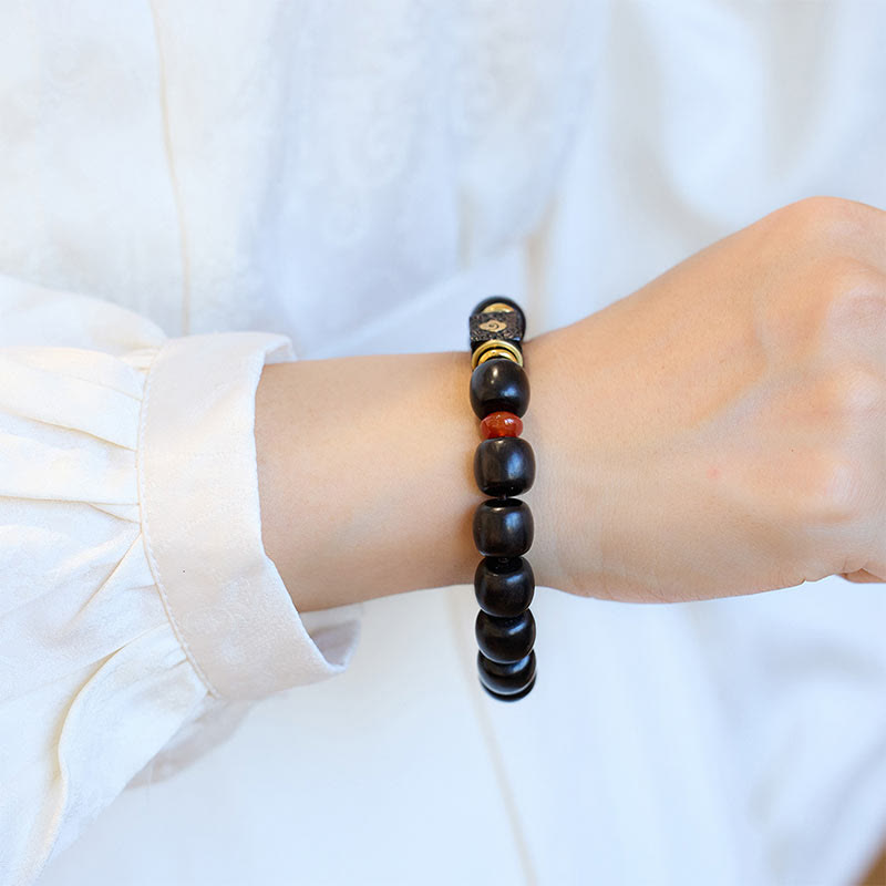 Bransoletka Buddha Stones Ebony Drewno Pomyślne Chmury Grawerowane Spokojne