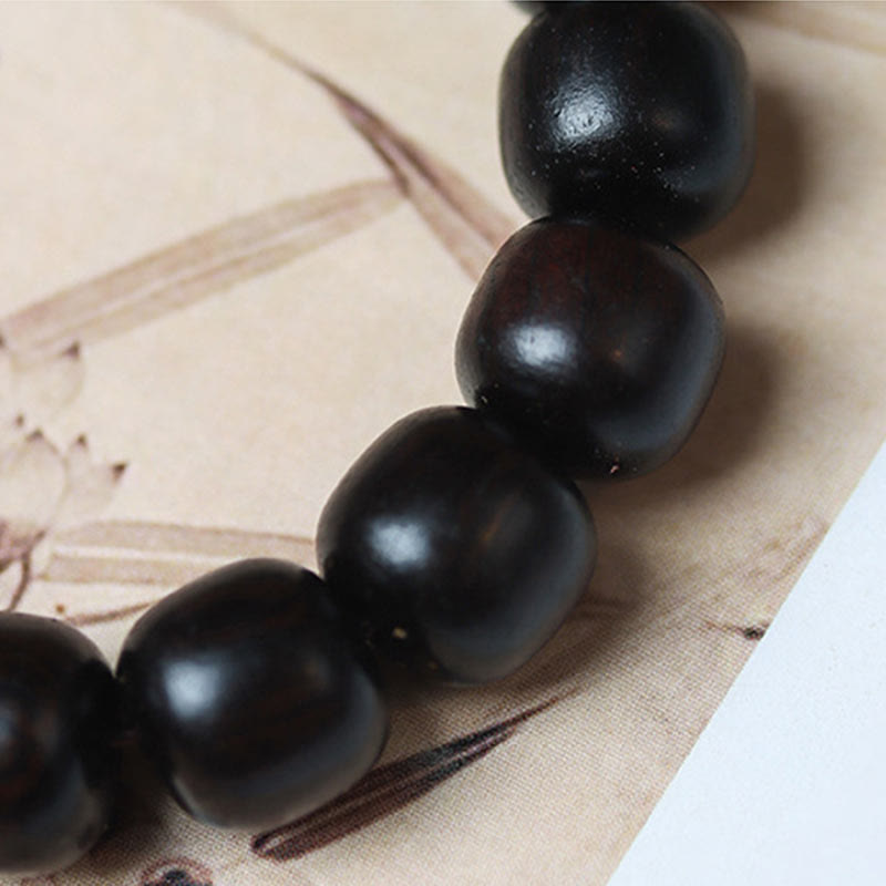 Bransoletka Buddha Stones Ebony Drewno Pomyślne Chmury Grawerowane Spokojne