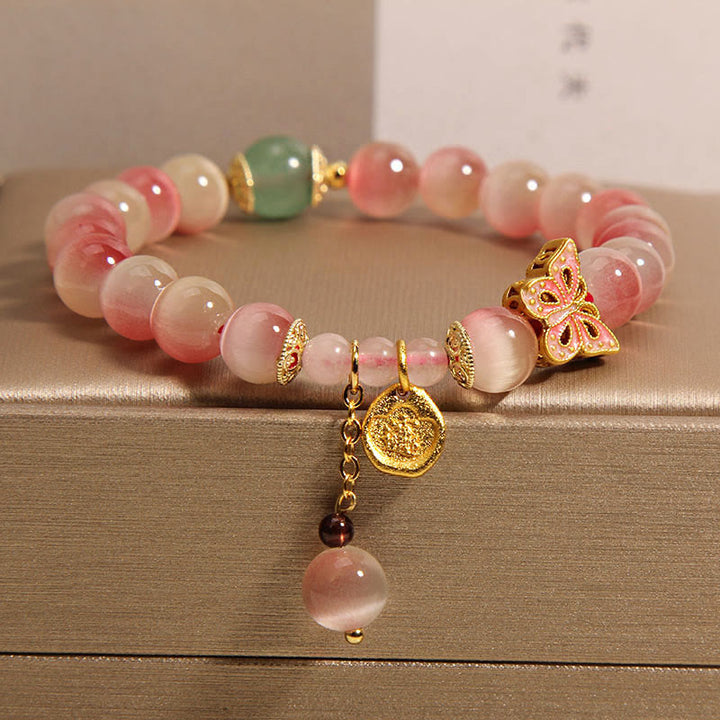 Bransoletka Buddha Stones Gradient Pink Cat's Eye Butterfly Peace