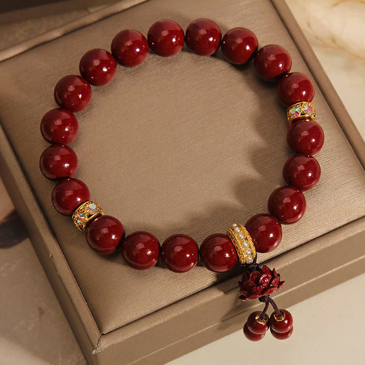 Bransoletka z zawieszkami Buddha Stones Cinnabar Lotus Blessing Charm