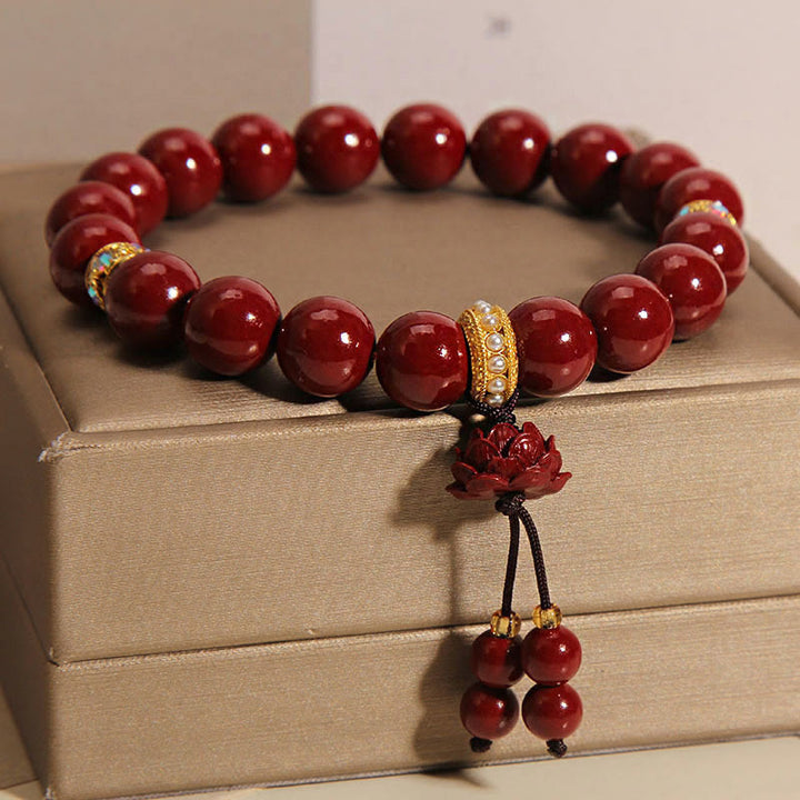 Bransoletka z zawieszkami Buddha Stones Cinnabar Lotus Blessing Charm