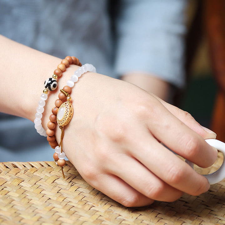 Buddha Stones, drzewo sandałowe, kocie oko, trójoczna bransoletka ochronna z koralików Dzi