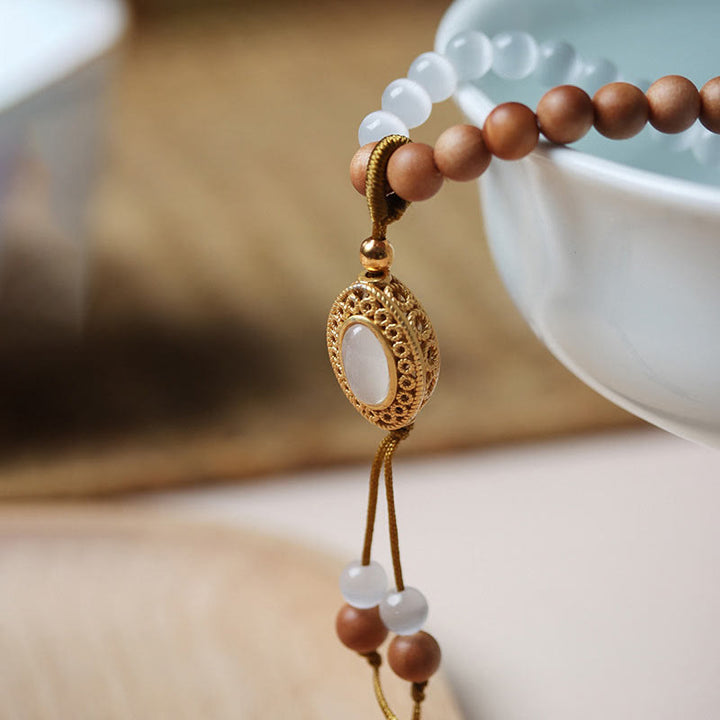 Buddha Stones, drzewo sandałowe, kocie oko, trójoczna bransoletka ochronna z koralików Dzi