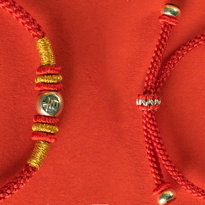 Bransoletka ochronna z czerwonymi Buddha Stones i znakami chińskimi