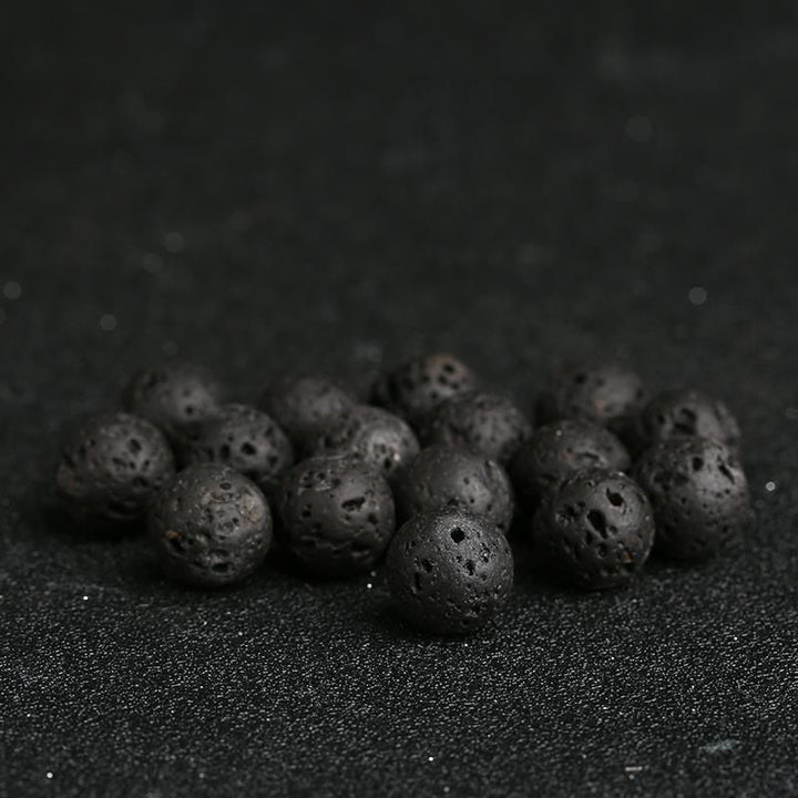 Bransoletka lecznicza z Buddha Stones , kamieniami lawowymi, kamieniami złotymi i niebieskim piaskowcem