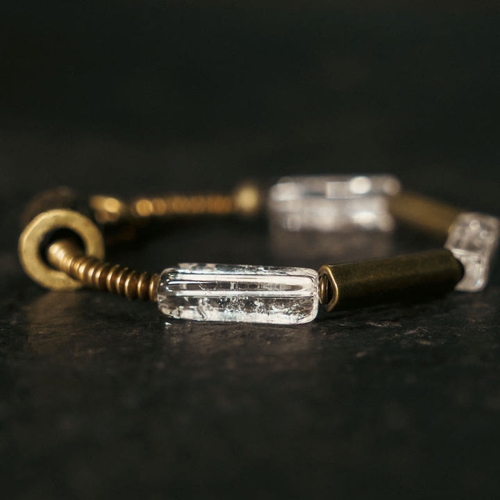 Bransoletka szczęścia z białych kryształów i miedzianych Buddha Stones