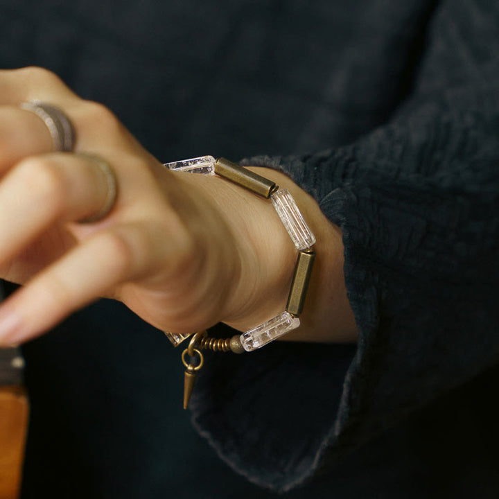 Bransoletka szczęścia z białych kryształów i miedzianych Buddha Stones