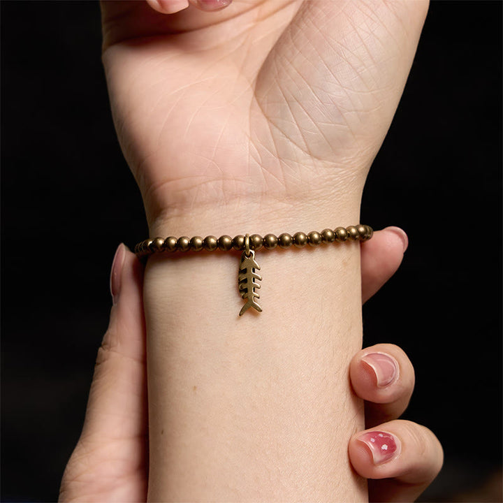 Bransoletka lecznicza z Buddha Stones, miedzianej kości ryby