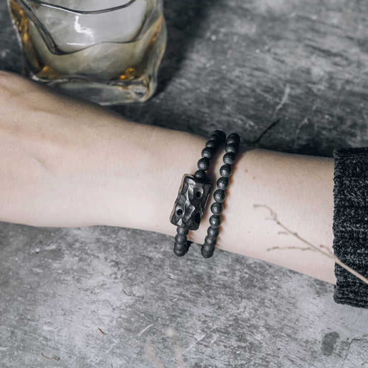 Bransoletka ochronna z podwójnym owinięciem z Buddha Stones o mrożonej powierzchni i czarnym onyksie z hebanu