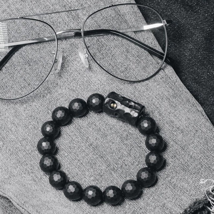 Bransoletka ochronna Buddha Stones z matowej, mrożonej powierzchni i czarnego onyksu z hebanu