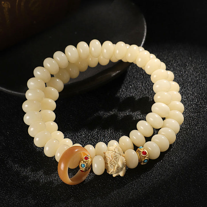 Bransoletka Buddha Stones Bodhi Seed Peach Wood Lotus Wealth Double Wrap