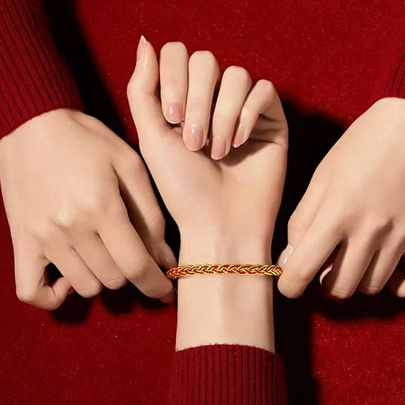 Bransoletka szczęścia z czerwonych sznurków i żółtego sznurka z Buddha Stones