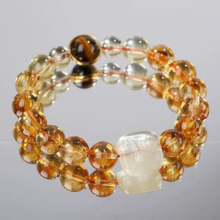 Bransoletka Buddha Stones Topaz Zashi Lhamo Kindness