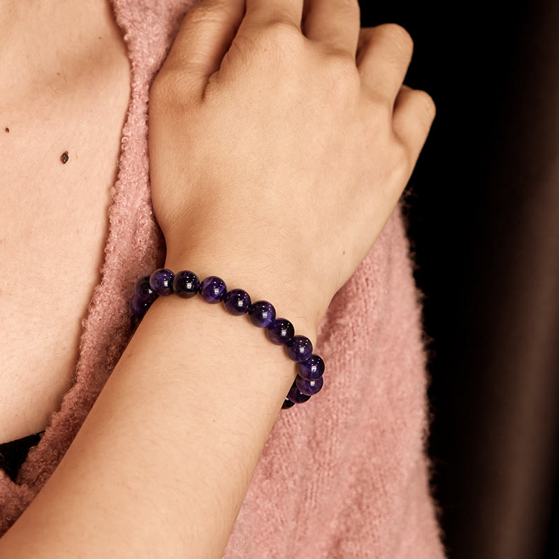 Bransoletka kreatywna z fioletowym tygrysim okiem i Buddha Stones