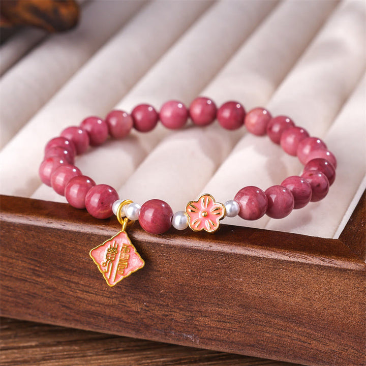 Bransoletka energetyczna Buddha Stones Rhodonite Peach Blossom Loving Energy