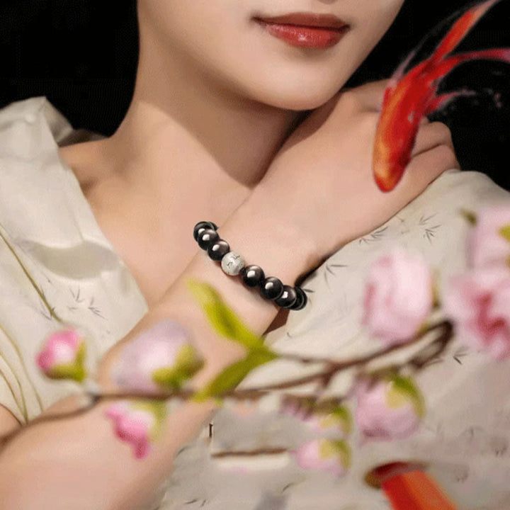 Bransoletka ochronna z Buddha Stones Natural Silver Sheen Om Mani Padme Hum