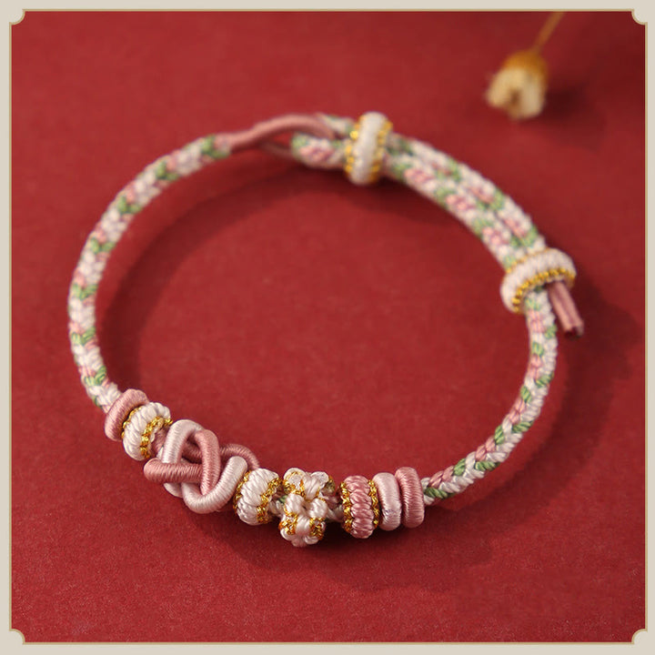 Buddha Stones ręcznie robione brzoskwiniowe kwiaty węzeł pokoju kolorowa lina regulowana bransoletka