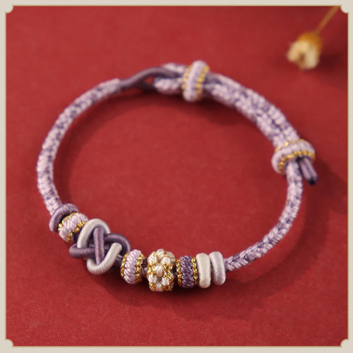 Buddha Stones ręcznie robione brzoskwiniowe kwiaty węzeł pokoju kolorowa lina regulowana bransoletka