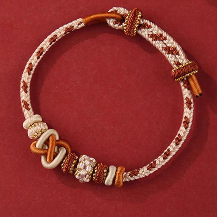Buddha Stones ręcznie robione brzoskwiniowe kwiaty węzeł pokoju kolorowa lina regulowana bransoletka