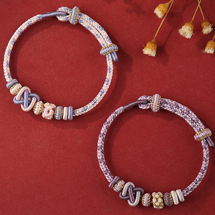 Buddha Stones ręcznie robione brzoskwiniowe kwiaty węzeł pokoju kolorowa lina regulowana bransoletka