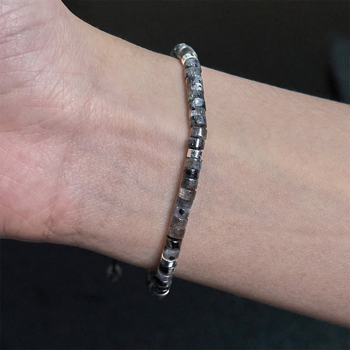 Bransoletka z koralików dystansowych Buddha Stones Natural Black Glitter Stone Courage