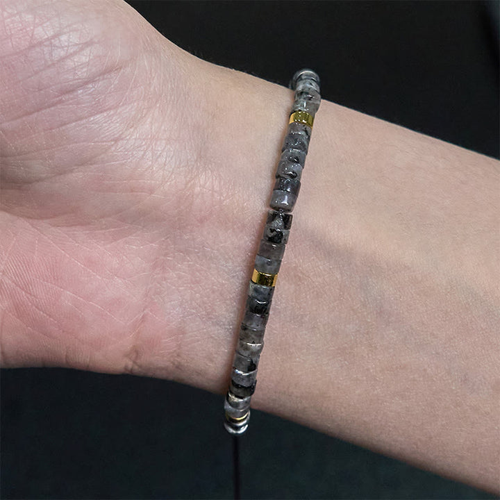 Bransoletka z koralików dystansowych Buddha Stones Natural Black Glitter Stone Courage