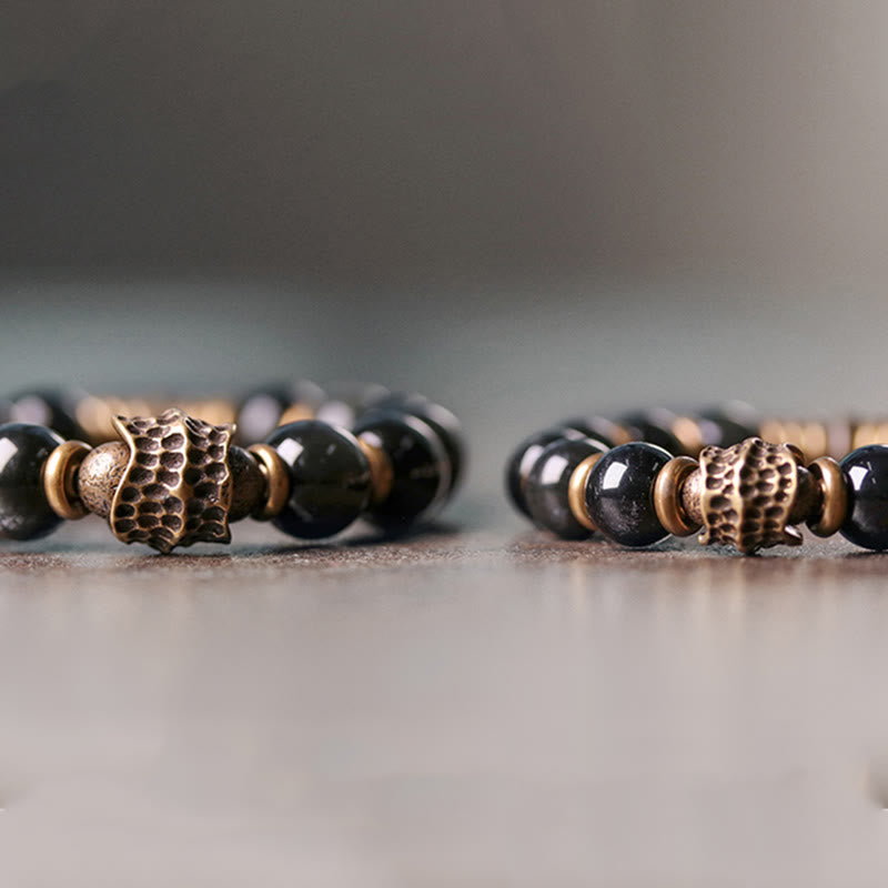 Bransoletka uzdrawiająca z tęczowego obsydianu i miedzi z Buddha Stones