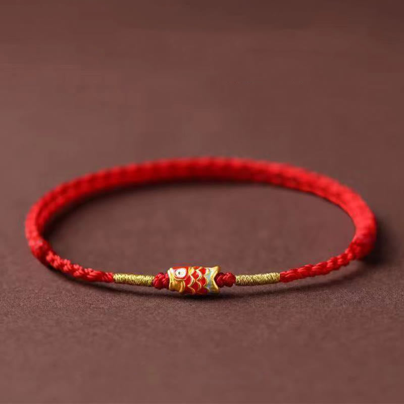 Bransoletka z ręcznie plecionego czerwonego sznurka z motywem ryb Koi w Buddha Stones