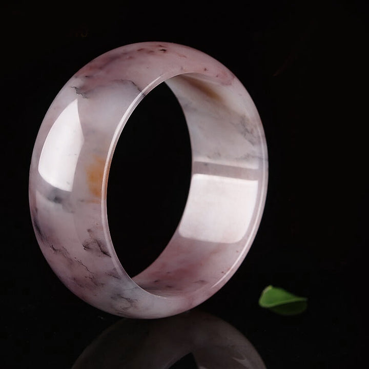 Bransoletka ochronna z fioletowym jadeitem i Buddha Stones