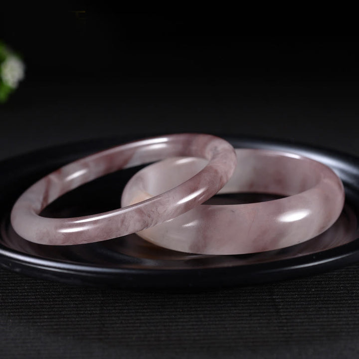 Bransoletka ochronna z fioletowym jadeitem i Buddha Stones