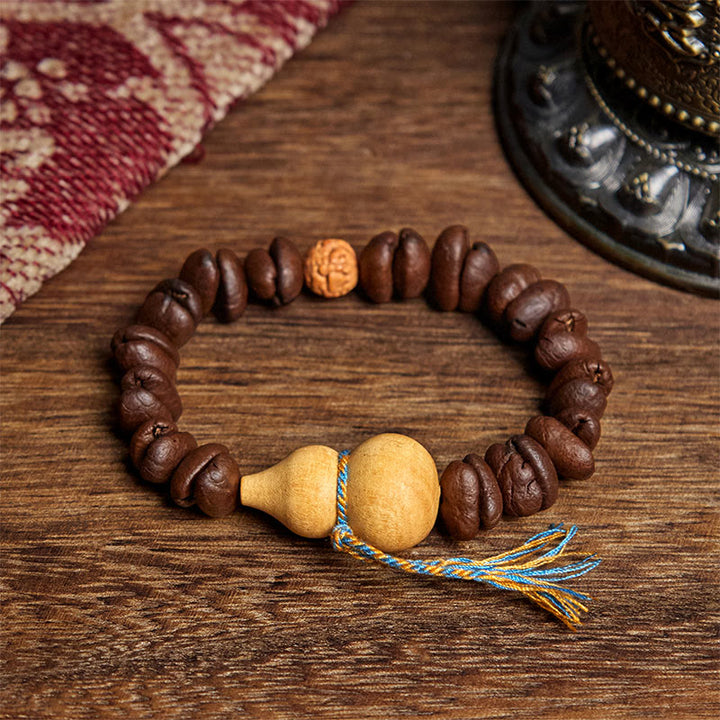 Bransoletka z naturalnych ziaren kawy i dyni Buddha Stones - Ziarno kawy (obwód nadgarstka: 17,5 cm) - image 1