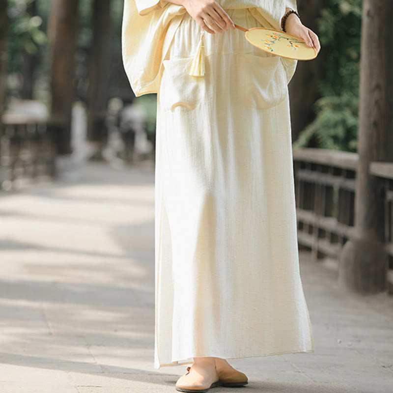 Spódnica damska z kieszeniami i rozcięciem u dołu w jednolitym kolorze z Buddha Stones - image 1