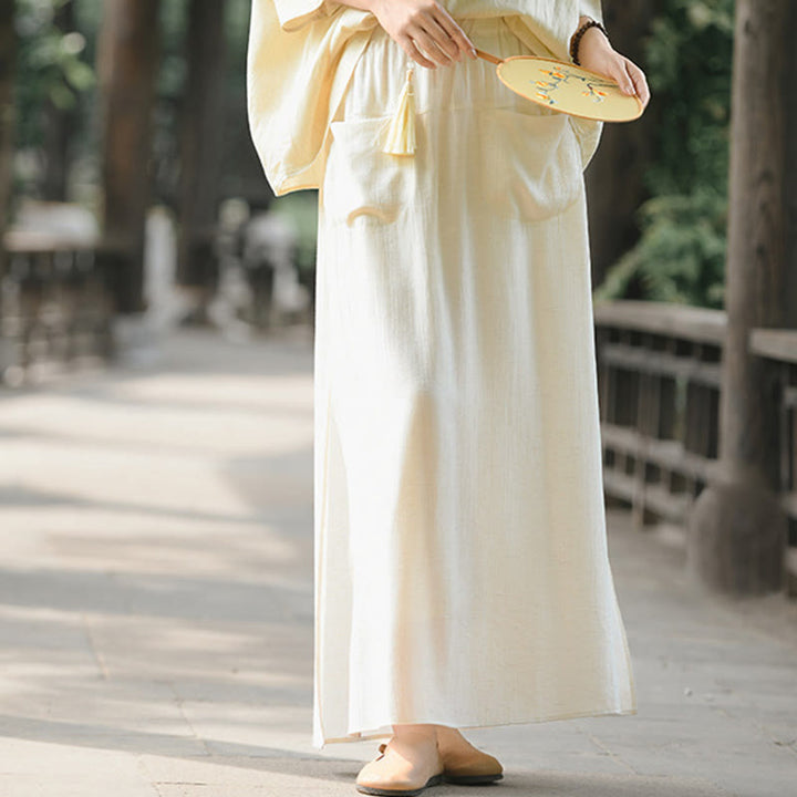 Spódnica damska z kieszeniami i rozcięciem u dołu w jednolitym kolorze z Buddha Stones - image 1